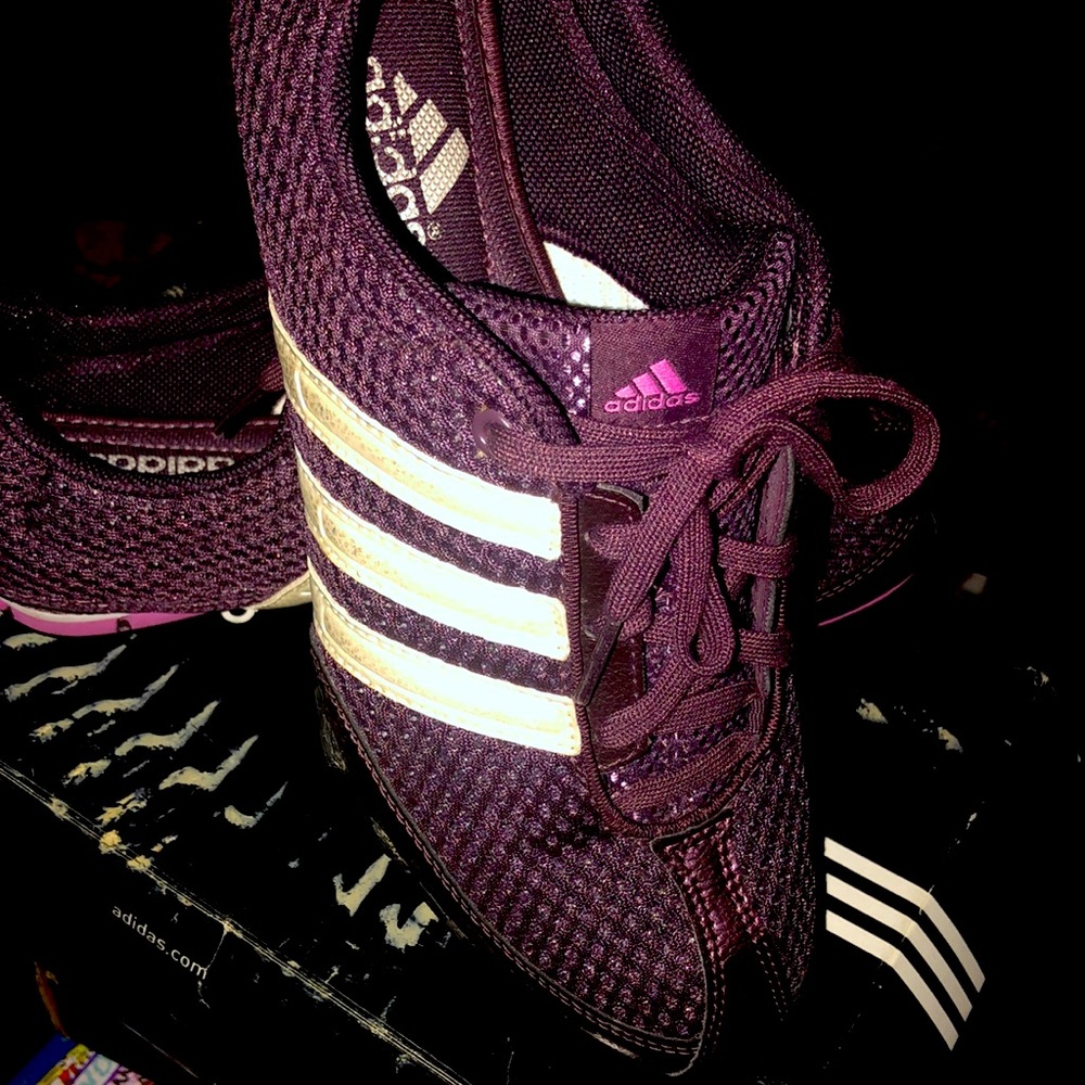Adidas beautiful dark purple with pink trimming.